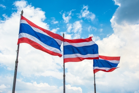 three flag pole of thailand on blue sky backgroundsの写真素材