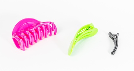 three plastic hair clip isolated on white backgroundsの写真素材