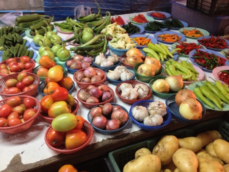 Many and lot of vegetable on dish and basket for sell in fresh marketの素材