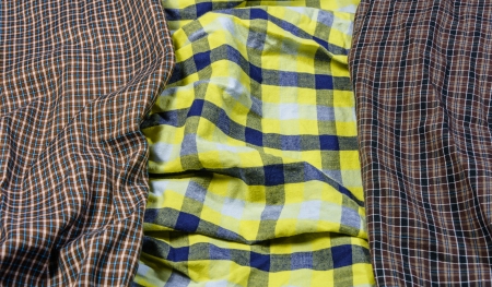 close up old plaid three color tone textile fabric pattern detailの写真素材