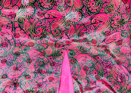close up abstract fabric old vintage style deep pink color tone pattern detail