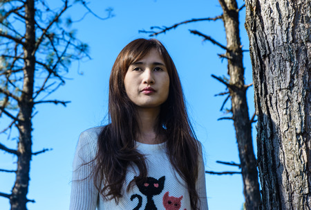 portrait asia young girl in the winter mountains on outdoor natural の写真素材