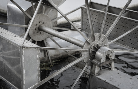 old machine Electric turbine for pump oxygen in water lakeの写真素材