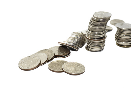High pile of silver coins thailand isolated on white background