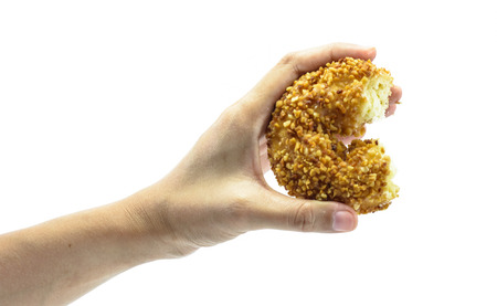 girl hand hold donuts food isolated on white backgroundの写真素材