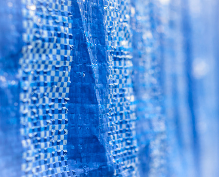 close up blue plastic bag sack of background, woven texture detailの写真素材