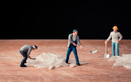 close up Miniature worker man amd rice seed food with retro filterの写真素材