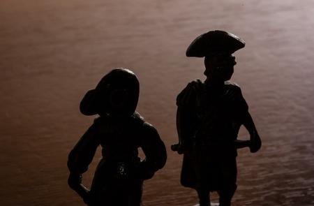 silhouette of miniature old knight toy warriorの写真素材