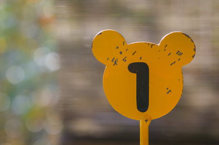 number one. black lettering on a yellow background