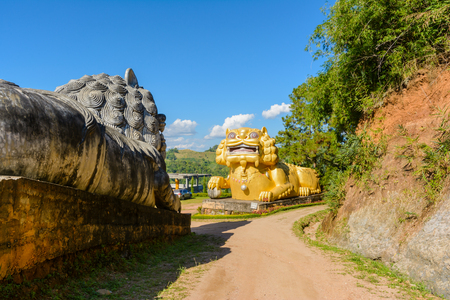 Mae salong Chiang rai,THAILAND - November 20, 2015:   Big old statue of a lion chinese style on natural tea farm for tourism travel people at Wang Put tarn tea Farm Mae salong ,Chiang Rai Thailandのeditorial素材