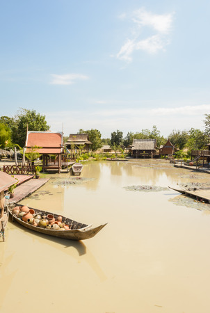 lake nature with asia house villageの写真素材