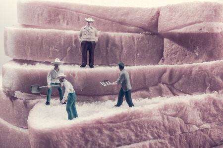 miniature people worker on sliced bread (work on bread) with retro filterの写真素材
