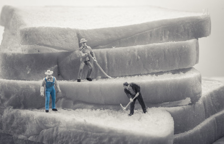 miniature people worker on sliced bread (work on bread) with retro filterの写真素材