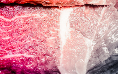 close up fresh beef piece background (beef raw food) with retro filterの写真素材