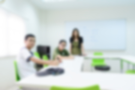 blurred background of man and woman about meeting roomの写真素材