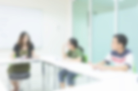 blurred background of man and woman about meeting roomの写真素材