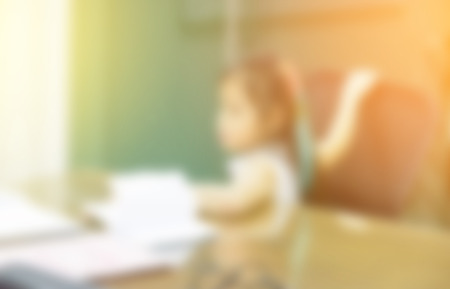 blurred background of child learning education in class roomの写真素材