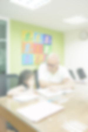 blurred background of child learning education in class room with teacherの写真素材