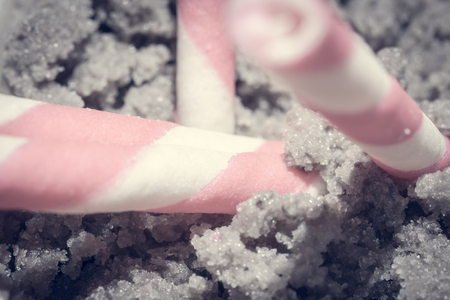 wafer rolls stick on ice cream with retro filterの写真素材