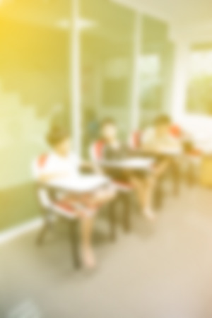 blurred background of student class child learning education in class room with teacherの写真素材