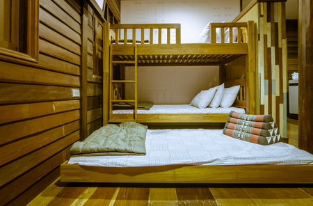 old wood style home bed room background with retro vintage filterの写真素材
