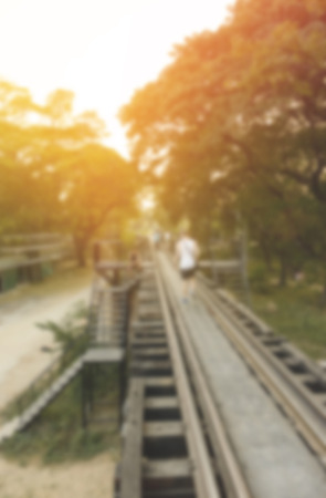 blur background of travel people on old railway outdoorの写真素材