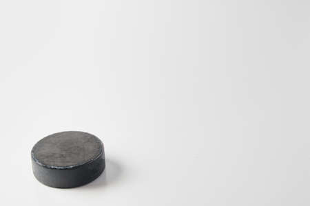 ice hockey puck white backgroundの写真素材