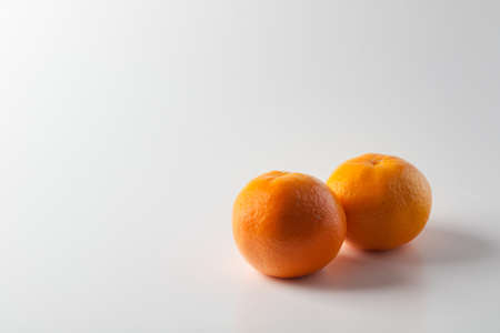 tangerines on white backgroundの写真素材