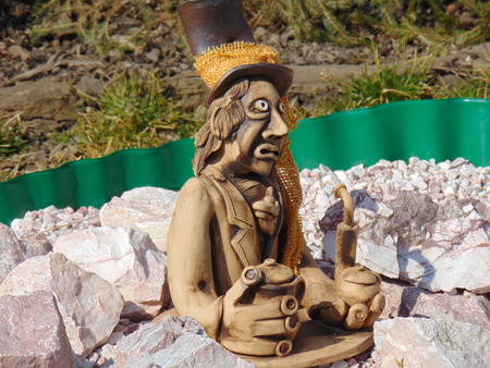 Home pond and garden gnome statue .の写真素材