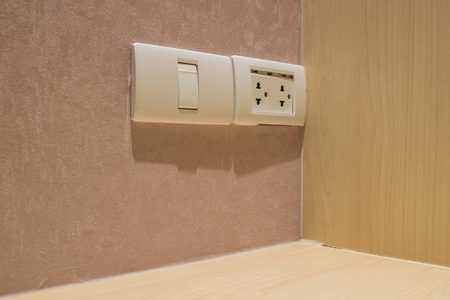 light switch and electric plug socketの写真素材
