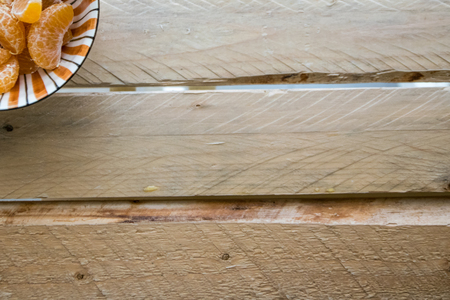 cup of orange top view on wooden backgroundの写真素材