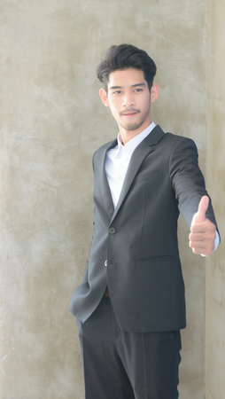 businessman showing thumbs upの写真素材