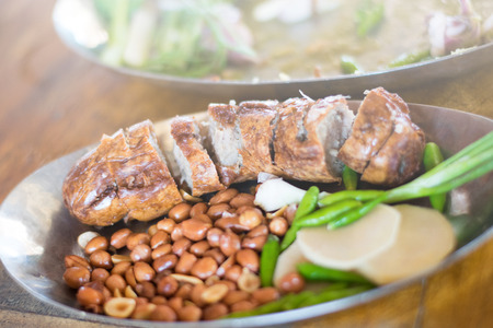 Thai Food,Pork sausage Served with peanuts in a white bowl.の写真素材