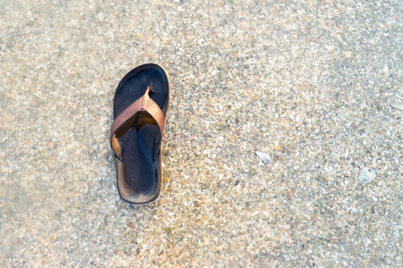 Slippers on the seaの写真素材