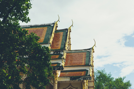 The Roof Wat Thai,Green Tree on sky Backgroundの写真素材