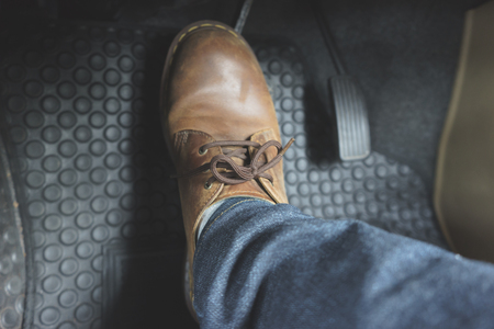 Close up Leather Shoe ob pedal in carの写真素材