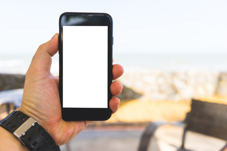 hand on smartphone Concept travel on vacationの写真素材