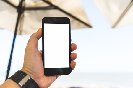 hand on smartphone Concept travel on vacationの写真素材