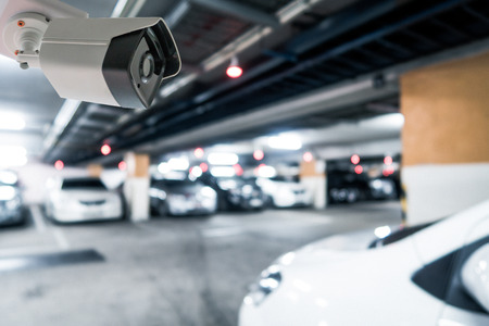 CCTV Blur image and Boken Night Car Parkingの写真素材