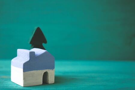 House and tree on green backgroundの写真素材