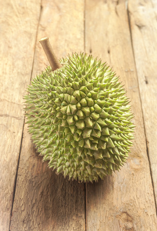 Durian fresh yellow fruit on wooden backgroundの写真素材