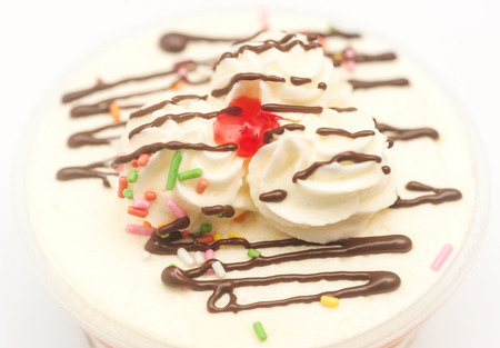 Fruit cake with chocolate, white cream, and red jelly, Selective focusの写真素材