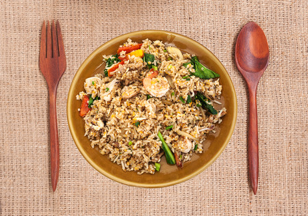 Rice fried with shrimp and vegetables on cloth backgroundの写真素材