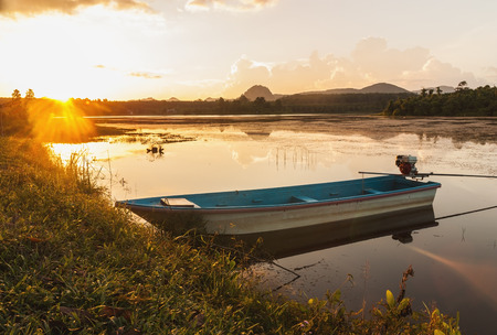 Boat in the river with color of sunlight beautiful of natureの写真素材
