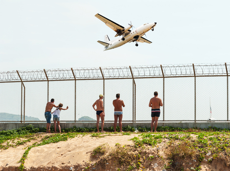 Some people looking airport with Old airplaneのeditorial素材