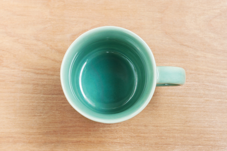 White cup top view on wooden table, Cup of coffee with texture and pattern wooden and copy space for text hereの写真素材