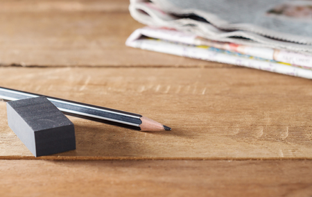 Mistake erase concept, Pencil with eraser on wooden backgroundの写真素材