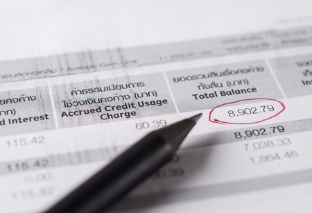 Save money concept, Utility bill with pencil on paper bill backgroundの写真素材