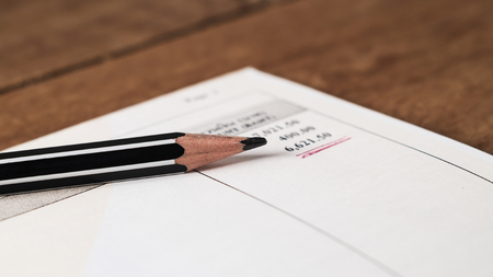 Save money concept, Utility bill with pencil on paper bill backgroundの写真素材