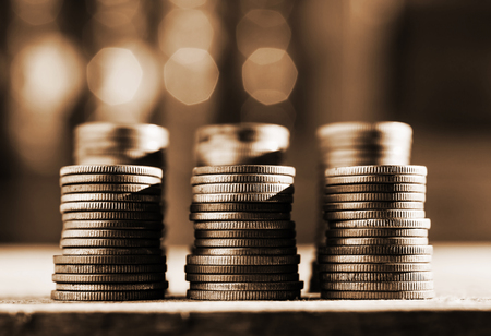 Rows of coins and account for finance and banking concept, Money coin stack growing businessの写真素材